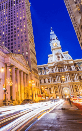 City Hall in Philadelphia at night with colorful streaks of light